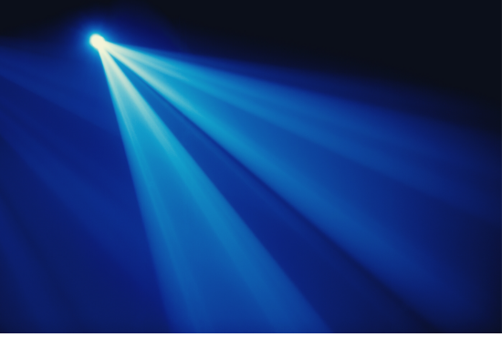 Spotlight on stage in blue